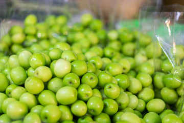 The ziziphus jujuba or the jujube fruit for sale at market. It is a small, round fruit with a sweet flavor and edible skin, this fruit has been used as a remedy for a wide array of health conditions. 