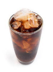 Pouring Coca Cola into glass Isolated white background