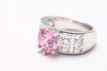 pink gem stone on diamond ring