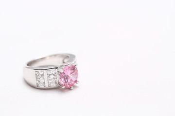 pink gem stone on diamond ring