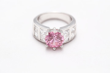 pink gem stone on diamond ring