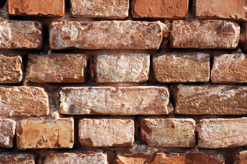 Red brick wall background texture. Background of old vintage red brick wall. Grunge red brick wall background with copy space. Old Brick Wall Background. Design template with place for text.