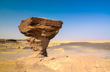 Rock formation at Sahara desert near Tchirozerine region, Agadez, Niger - obrazy, fototapety, plakaty