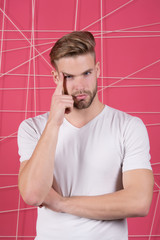Masculinity concept. Man with bristle on thoughtful face, pink background. Man with beard or...