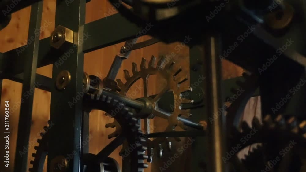 Poster close up shot of tower clock gears in motion