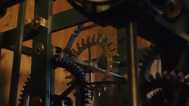 Close up shot of Tower clock gears in motion