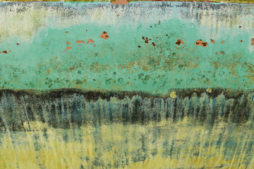 Rusty colorful painted metal texture close up
