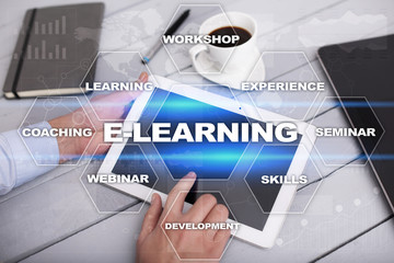 E-Learning on the virtual screen. Internet education concept.