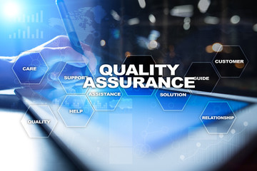 Quality assurance concept on the virtual screen. Business concept.