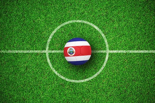 Composite image of football in costa rica colours