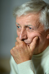 Thoughtful elderly man