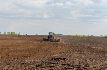Fototapeta premium spring plowed field