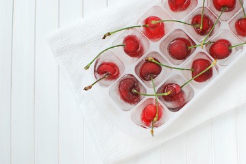 Wild cherry frozen in ice cube tray