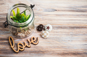 Greeting card with wooden sign Love