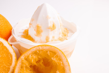 oranges and juice on a white background