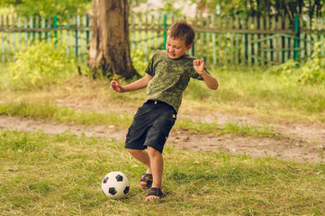 running boy playing with the ball