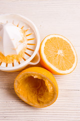 oranges and juice on a white background
