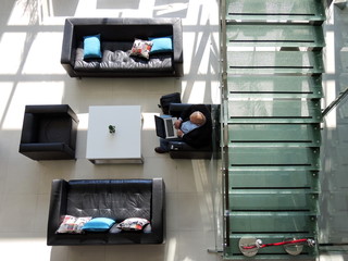 Belgrade, Serbia, 5th October 2016: Top view of working businessman sitting at table before corporate meeting