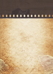 Vintage background with retro paper and old film strip
