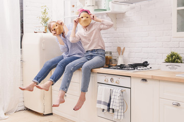 Two cheerful friends cook together. Friends Chef Cook Cooking Concept