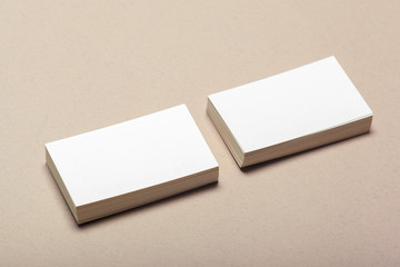 Blank paper pieces for mock up on a beige background