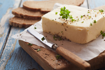 Homemade pat of farm fresh herbed butter