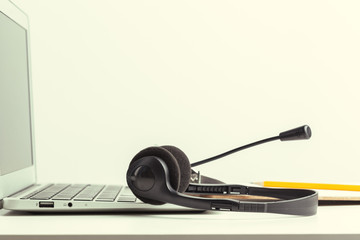headset and computer laptop, call center support