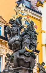 Fototapeta na wymiar Holy Trinity column in Karlovy Vary, Czech Republic. Close-up view of plague pillar in Carlsbad