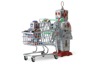 Tin toy robot pushing supermarket trolley cart with baby robot and drop shadow