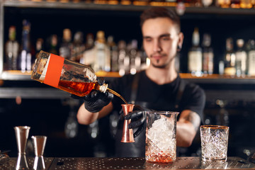 Bar. Bartender Making Cocktails, Measuring Alcohol