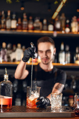 Cocktail Bar. Bartender Making Cocktails At Bar Counter
