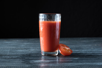 Red tomato and tomato juice
