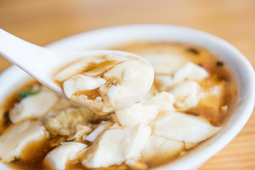 Closeup of jellied bean curd. Tofu pudding. Unique Traditional Chinese Foods