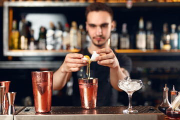 Cocktail Bar. Bartender Making Cocktails At Bar Counter