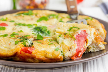 Omelet with broccoli and tomato, delicious healthy Breakfast, traditional morning food