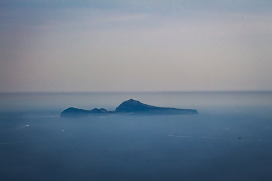 view of Capri island from the summit of Vesuvius vulcano; Campania, Italy