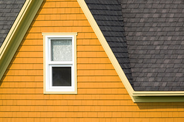 Yellow wall and grey roof