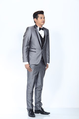 Obraz na płótnie Canvas Figure, Business Man Stand in formal Suit