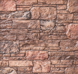 texture and structure of stone, tile, brown wall of blocks of decorative stone