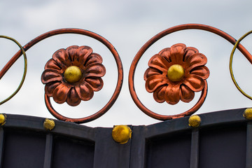 wrought-iron gates, ornamental forging, forged elements close-up