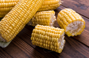 Fresh sweet corn on table