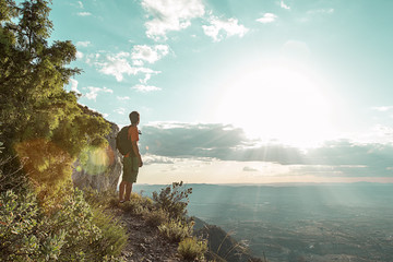 Guy trekking in the mountains