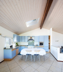 Modern kitchen with table and chairs