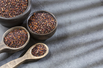 Black quinoa in wooden bowl - Chenopodium quinoa