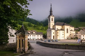 Fototapeta na wymiar Saint Anthony's Church in mountain village Zelezniki, Slovenia .