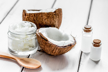 organic cosmetics concept with coconut on table background