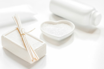 white cosmetic set on desk background