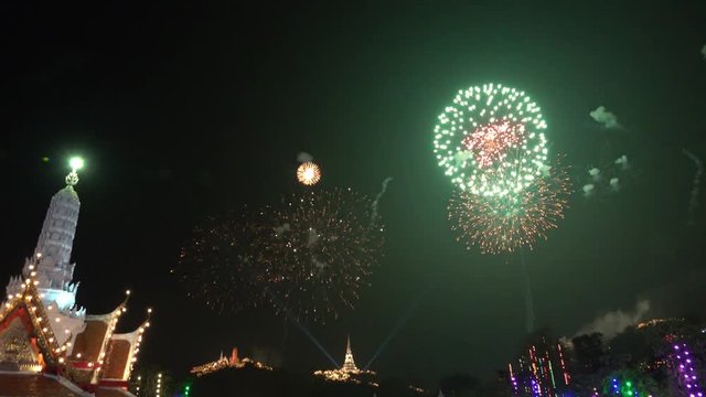 Firework display ,4K video. The most famous firework Pra Nakorn Kiri festival  Thailand with temple in  foreground and three pagodas on the hill in background.