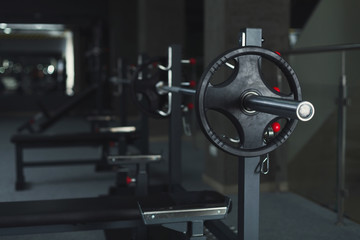 Modern gym interior with weightlifting equipment
