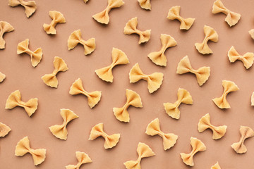 Bow tie Italian pasta fartalle pattern on pink background